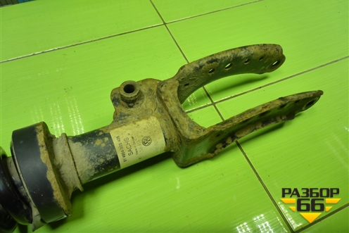 Амортизатор передний левый (7L6413031) для Volkswagen Touareg c 2002-2010г (Туарег)