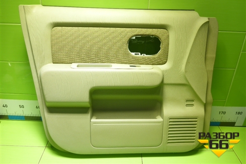 Обшивка двери передней левой под электрику (809013U000) для Nissan Cube с 2002-2008г